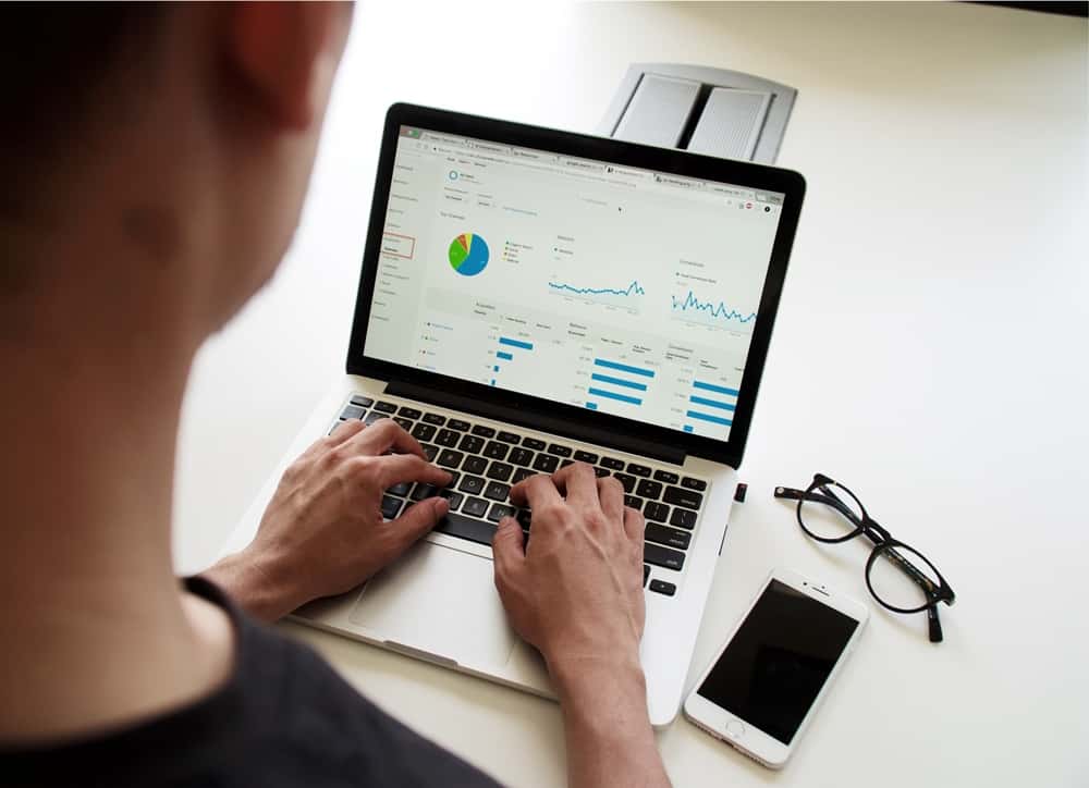 man using a google analytics dashboard